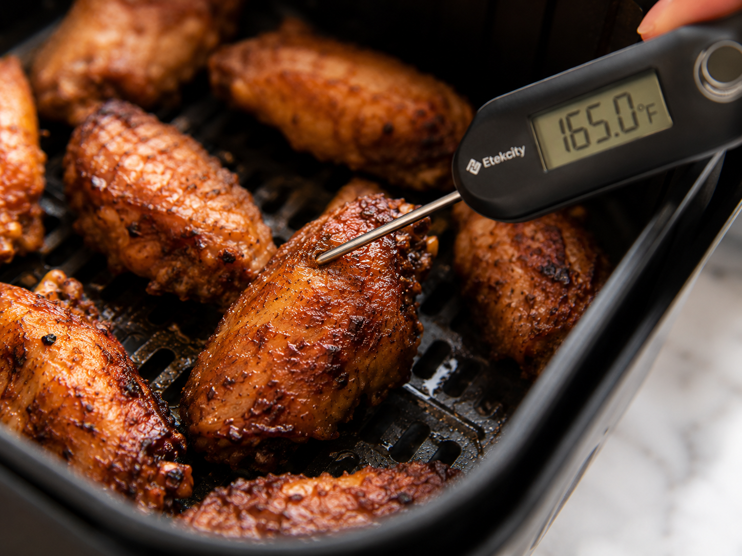 Wings after the high-heat finish at 400°F — deeply golden, shatteringly crispy skin