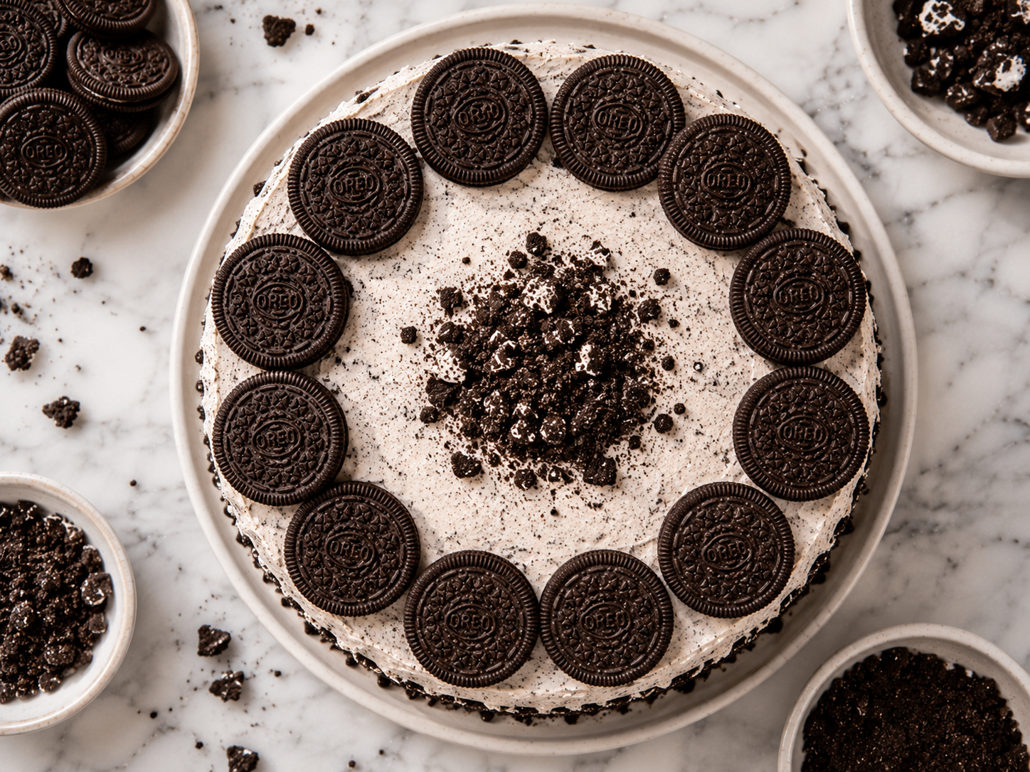 Whole Oreo cookies arranged on top of the frosted cake — decorated and ready to chill
