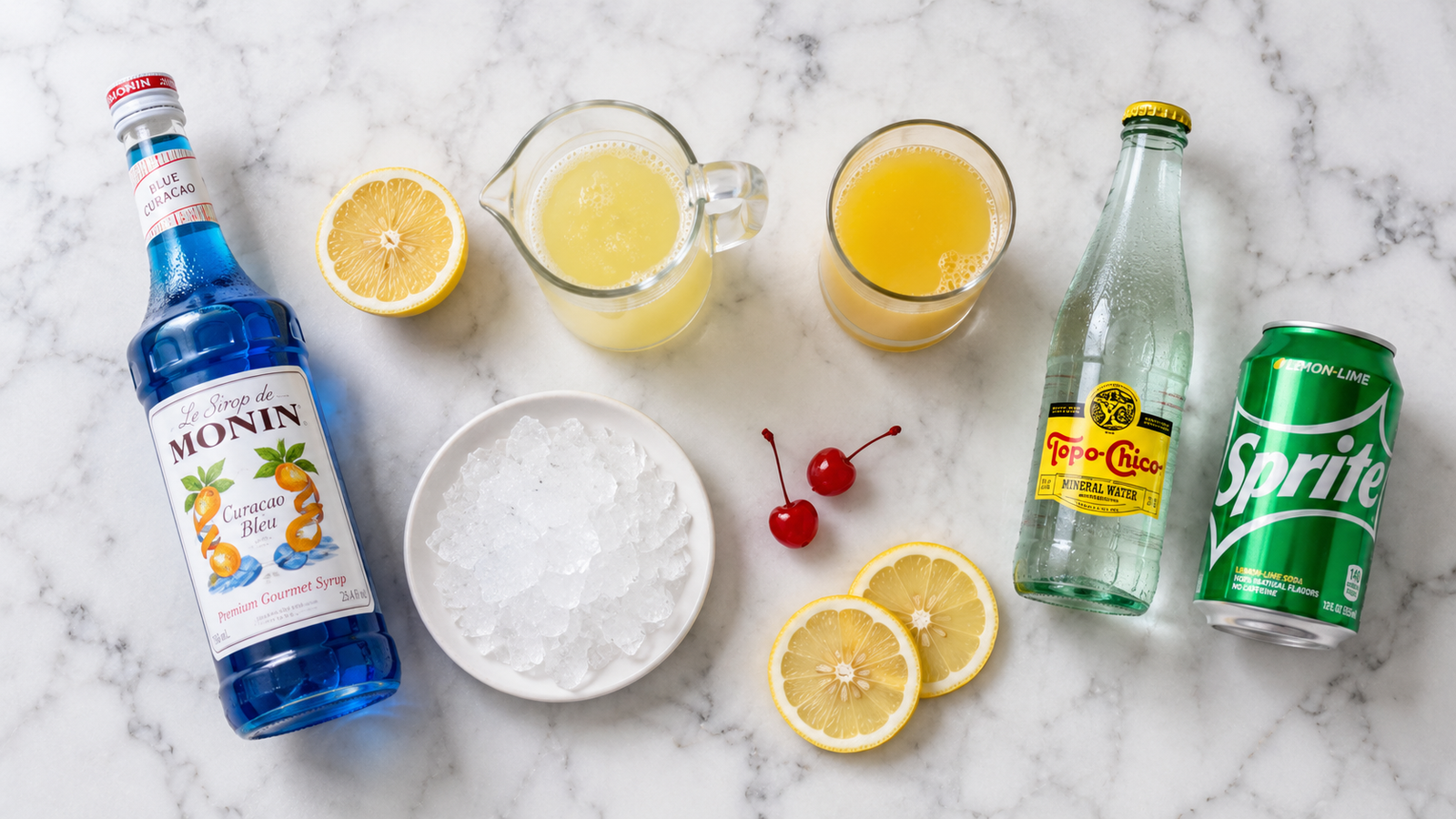 All Blue Lagoon mocktail ingredients laid out: blue curacao syrup, lemonade, pineapple juice, sparkling water, ice, lemon and cherries