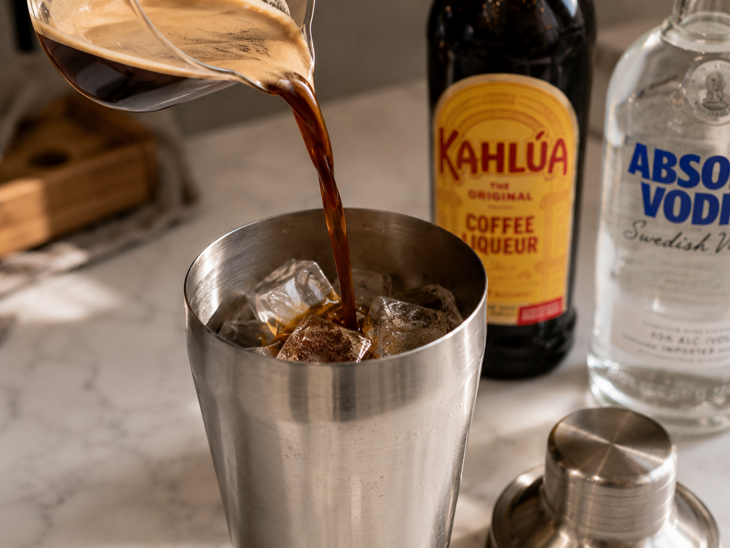 Vodka, cooled espresso, Kahlúa and simple syrup all added to the ice-filled shaker
