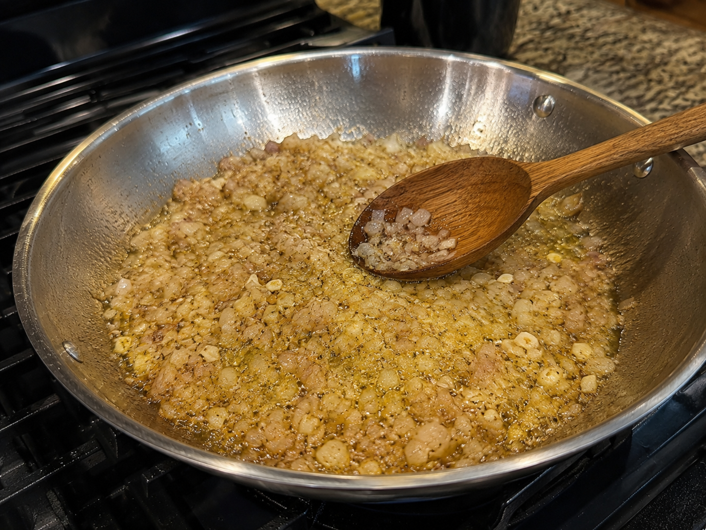 Shallot and garlic softening in butter and olive oil in the same skillet
