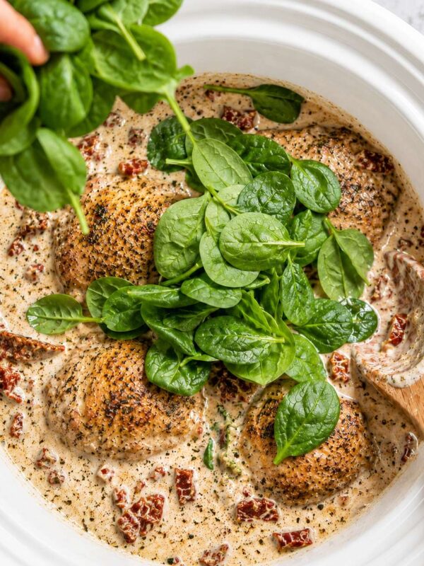 Creamy Tuscan Chicken Thighs Crockpot Recipe (Easy)