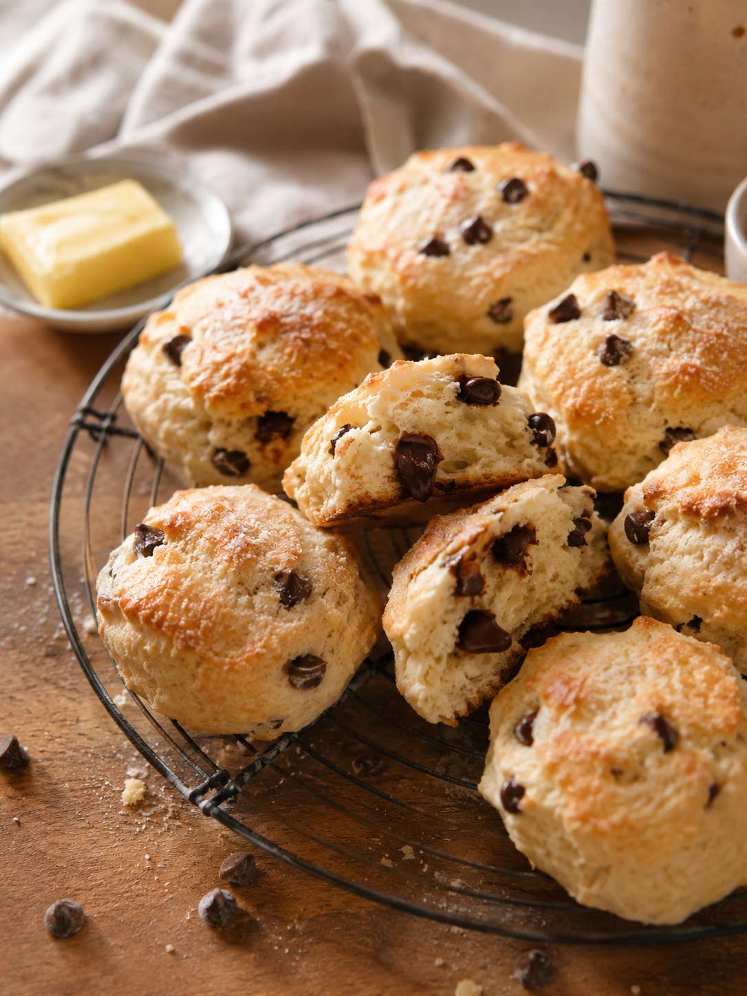 Freshly baked golden scones on a parchment-lined baking sheet