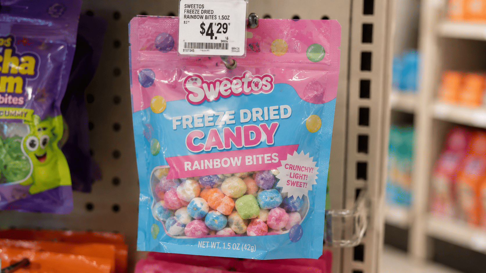 A small bag of freeze-dried candy with its price tag visible
