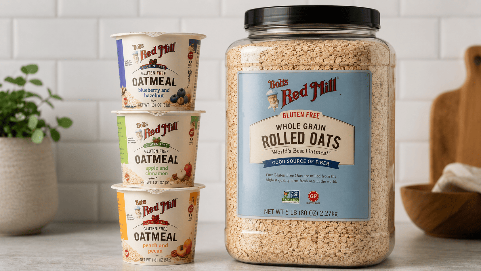 A stack of individual oatmeal cups next to a large bulk oats container