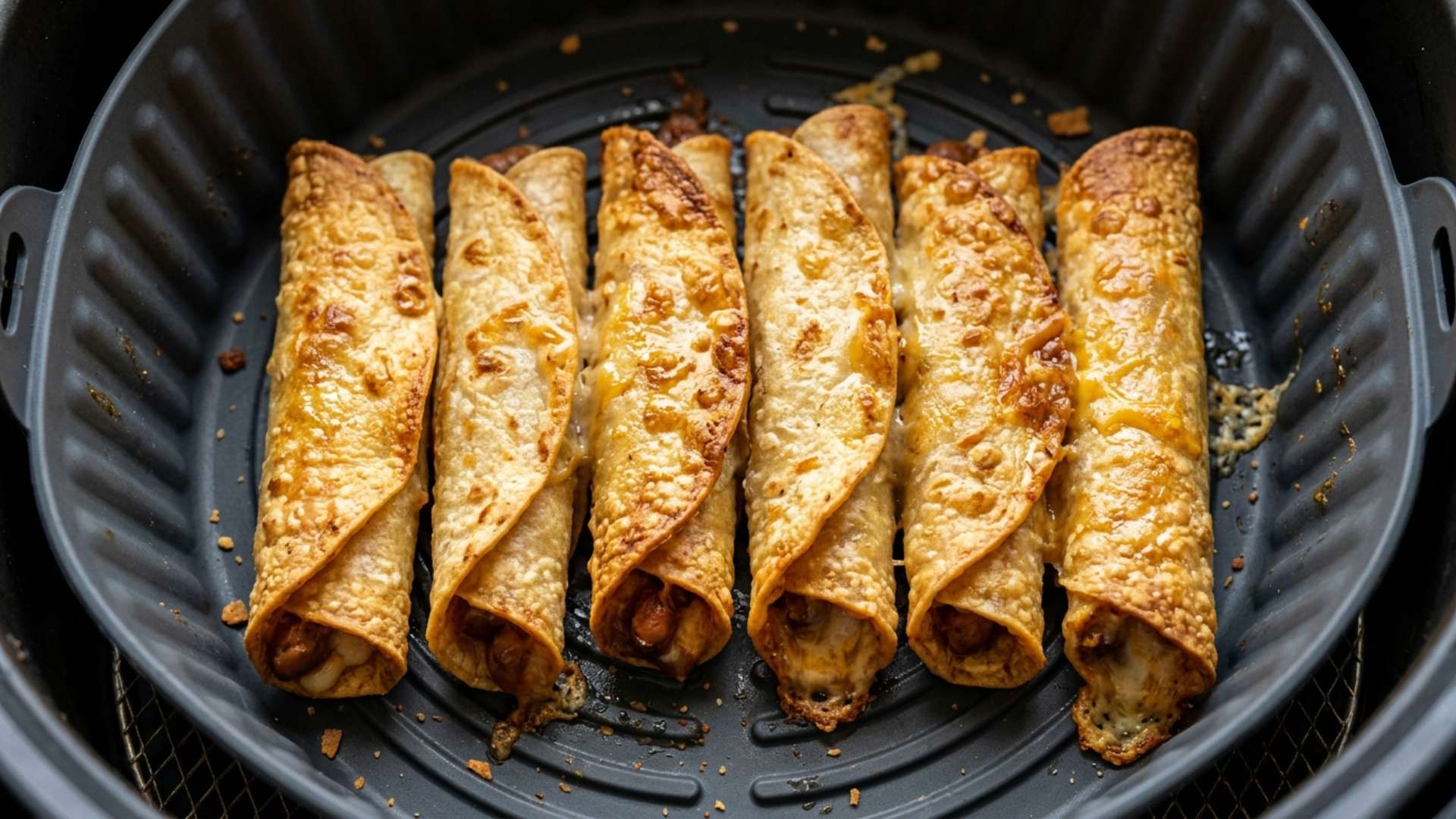 Crispy bean and cheese taquitos with salsa